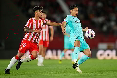 Vitor Roque challenged by Marcos Pena